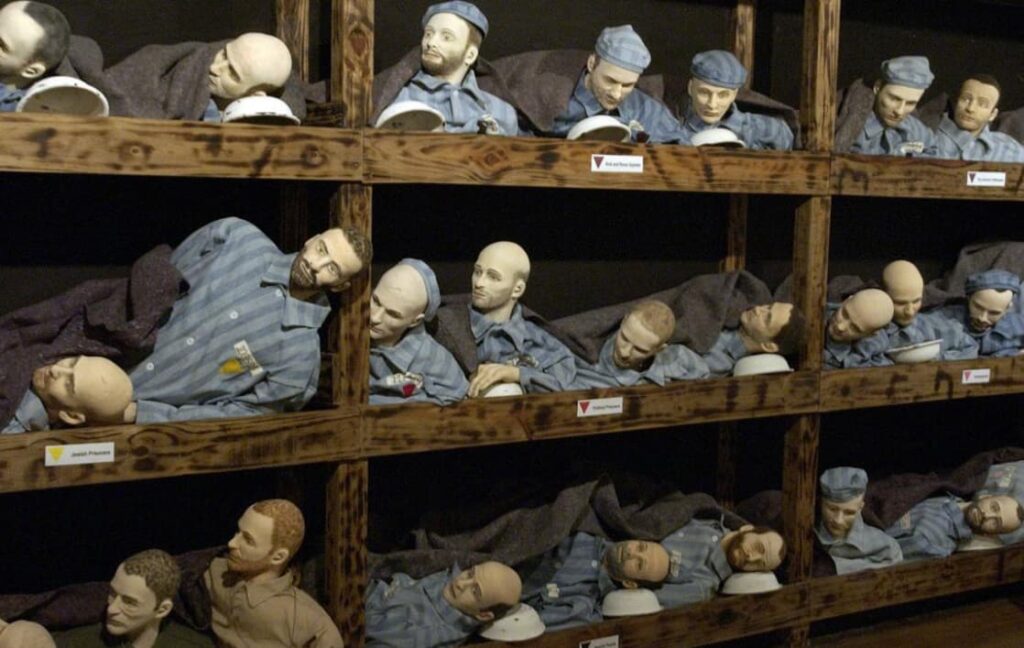 The Virginia Holocaust Museum – Exhibit displaying rows of mannequin heads and torsos in prisoner uniforms